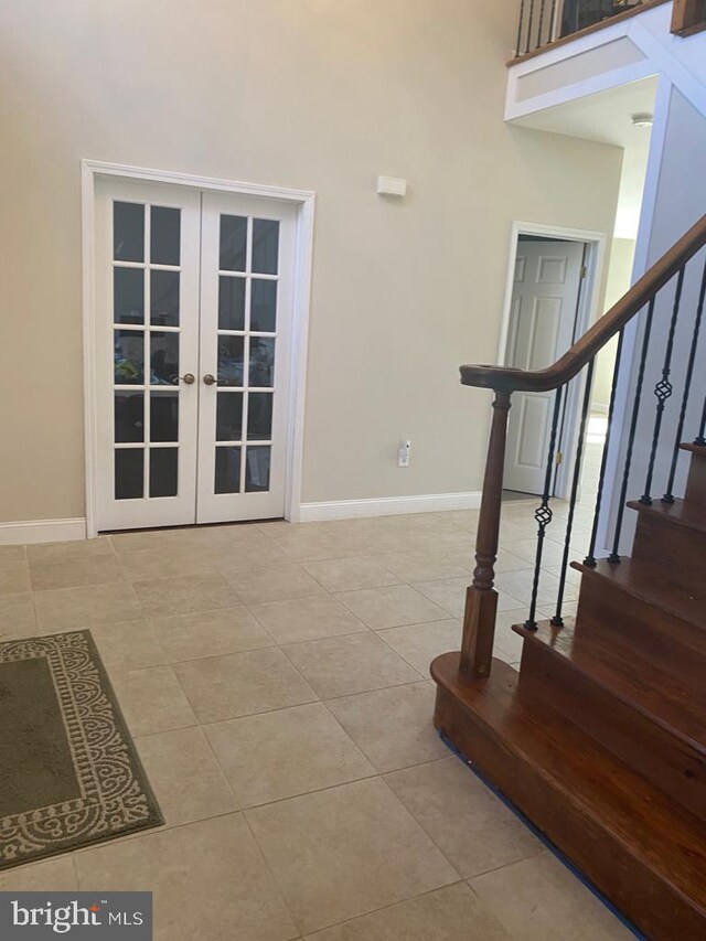 5 Sameera Ct, New Egypt, NJ 08533 - stairway featuring french doors and tile patterned floors