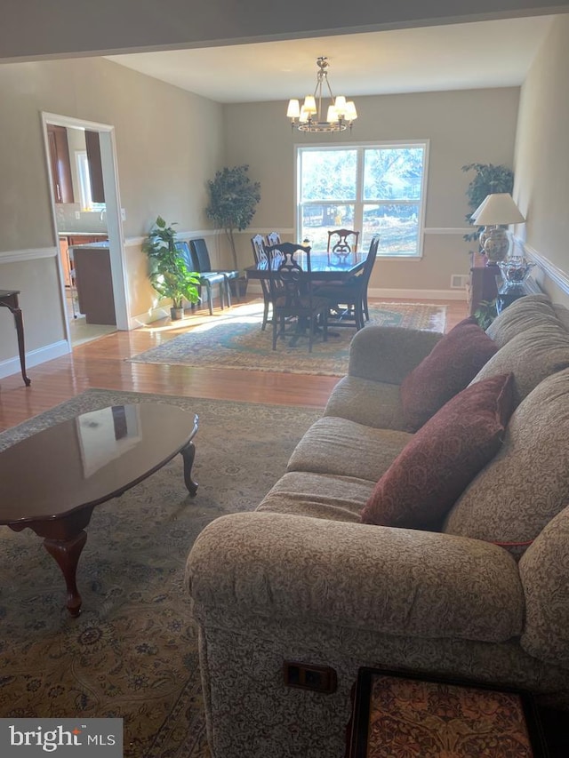 5 Sameera Ct, New Egypt, NJ 08533 - living room with wood finished floors and a chandelier