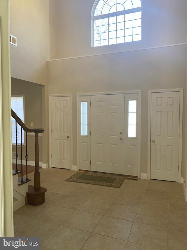 5 Sameera Ct, New Egypt, NJ 08533 - foyer with a towering ceiling, tile patterned floors, and stairs