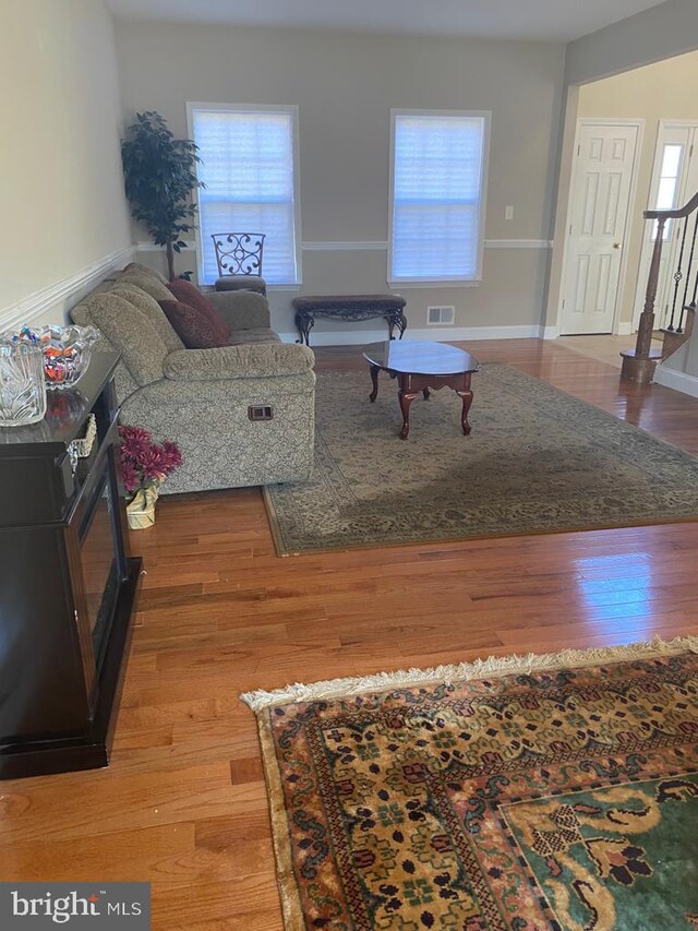5 Sameera Ct, New Egypt, NJ 08533 - living room featuring healthy amount of natural light, wood finished floors, and stairs