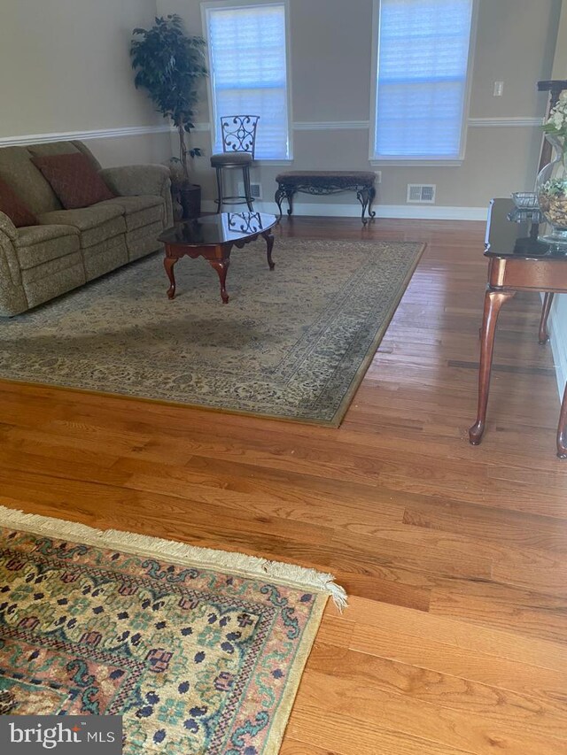 5 Sameera Ct, New Egypt, NJ 08533 - living area with wood finished floors and healthy amount of natural light