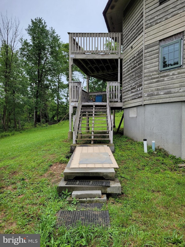 23 Shady Creek Ln, Mertztown, PA 19539 - view of grassy yard featuring stairway and a wooden deck