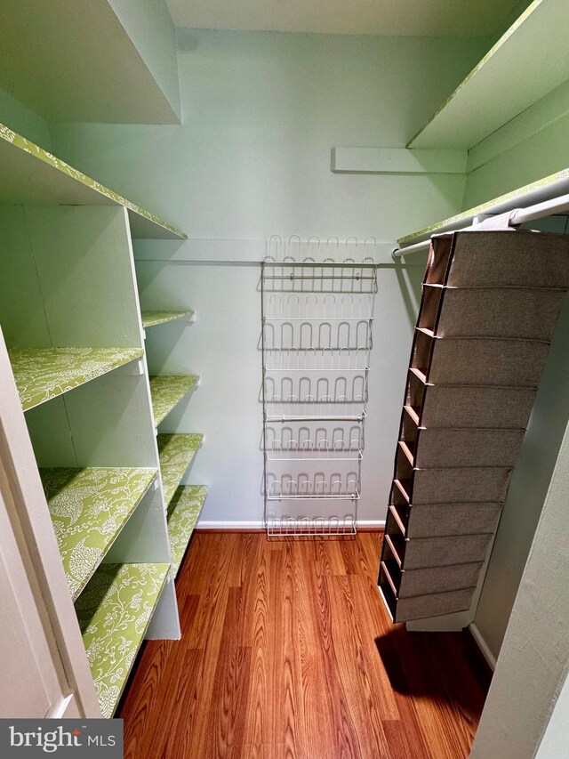 2200 Greenery Ln Unit 201-, Silver Spring, MD 20906 - walk in closet featuring wood finished floors