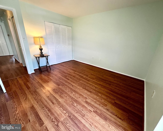 2200 Greenery Ln Unit 201-, Silver Spring, MD 20906 - unfurnished bedroom with wood finished floors and a closet