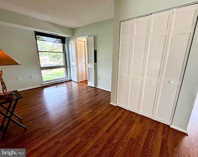 2200 Greenery Ln Unit 201-, Silver Spring, MD 20906 - unfurnished bedroom featuring wood finished floors