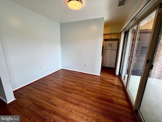 2200 Greenery Ln Unit 201-, Silver Spring, MD 20906 - unfurnished room featuring wood finished floors and baseboards