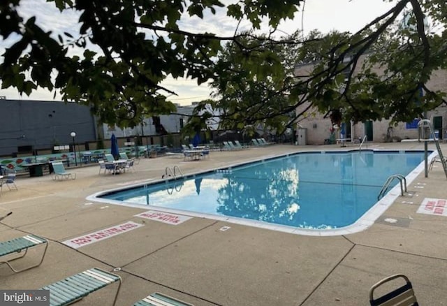 2200 Greenery Ln Unit 201-, Silver Spring, MD 20906 - community pool with a patio
