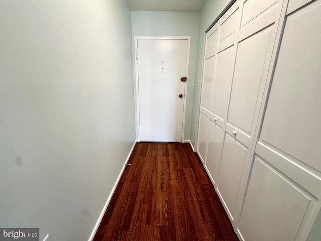 2200 Greenery Ln Unit 201-, Silver Spring, MD 20906 - hallway featuring dark wood-style flooring and baseboards