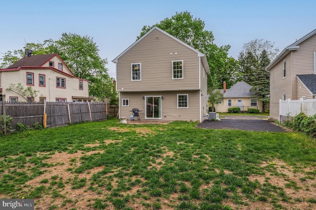 57 Jarvis St, Pemberton, NJ 08068 - back of property with a patio area and central AC