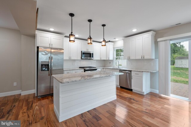 57 Jarvis St, Pemberton, NJ 08068 - kitchen featuring stainless steel appliances, a sink, baseboards, backsplash, and recessed lighting