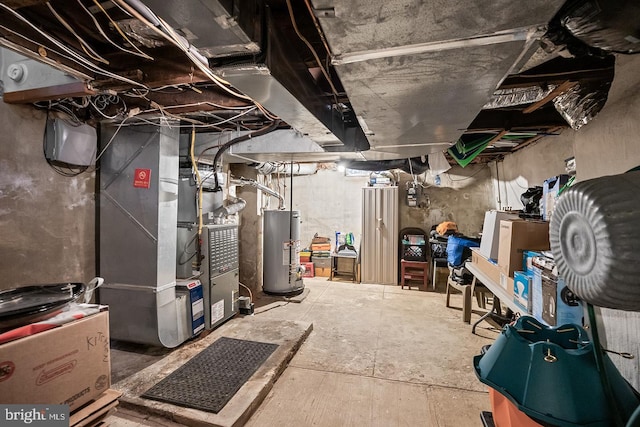 1621 E Hewson St, Philadelphia, PA 19125 - unfinished below grade area featuring water heater and heating unit