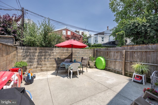 1621 E Hewson St, Philadelphia, PA 19125 - fenced backyard with a patio and outdoor dining space