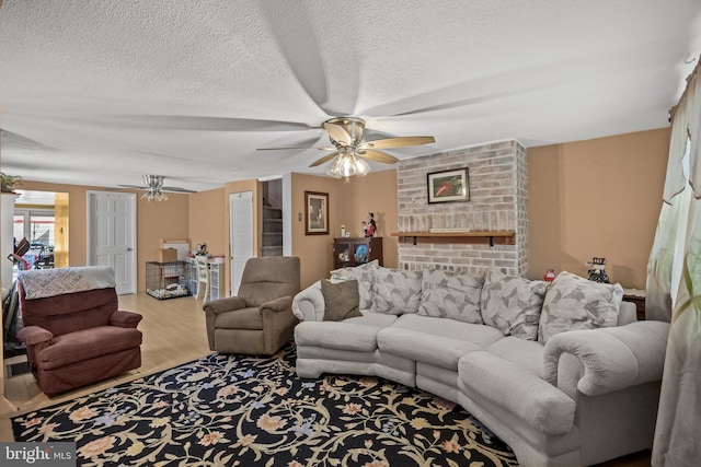 1621 E Hewson St, Philadelphia, PA 19125 - living room featuring ceiling fan, wood finished floors, and a textured ceiling