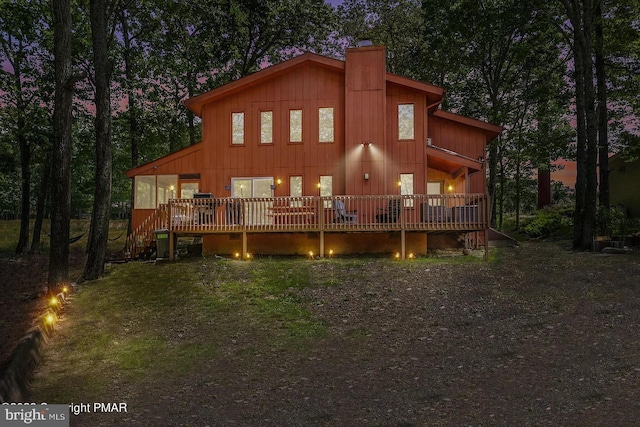 138 Banbury Dr, Bushkill, PA 18324 - rear view of property featuring a chimney and a deck