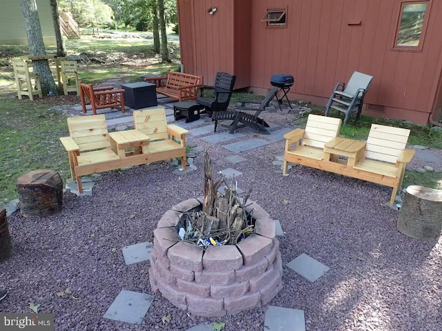 138 Banbury Dr, Bushkill, PA 18324 - view of patio with an outdoor living space with a fire pit