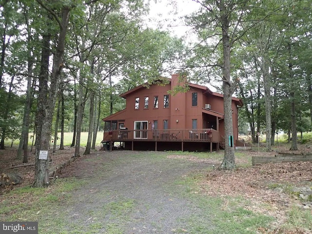 138 Banbury Dr, Bushkill, PA 18324 - rear view of house with a wooden deck
