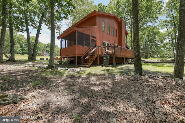 138 Banbury Dr, Bushkill, PA 18324 - rear view of property with a sunroom, a deck, and stairway