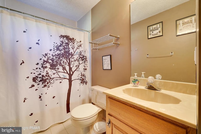 138 Banbury Dr, Bushkill, PA 18324 - bathroom featuring a textured ceiling, vanity, toilet, tile patterned flooring, and curtained shower