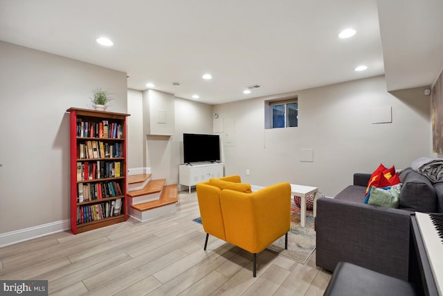 1917 H St NE, Washington, DC 20002 - living room with light wood-type flooring, recessed lighting, and baseboards