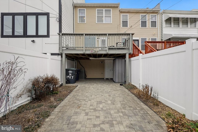 1917 H St NE, Washington, DC 20002 - rear view of house with a deck and decorative driveway
