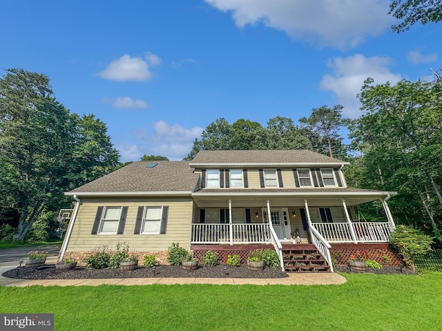14371 Bristow Rd, Manassas, VA 20112 - colonial house with a porch, a front yard, and a shingled roof