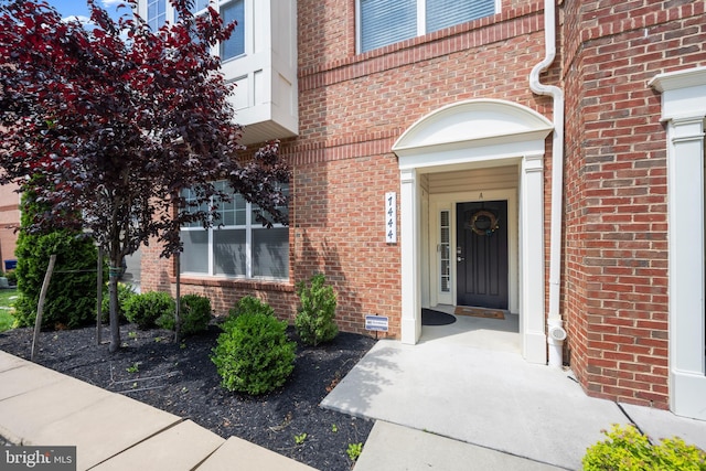 7444 Saint Margarets Blvd Unit A, Hanover, MD 21076 - doorway to property featuring brick siding