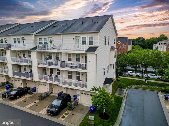 7444 Saint Margarets Blvd Unit A, Hanover, MD 21076 - view of property with an attached garage and driveway