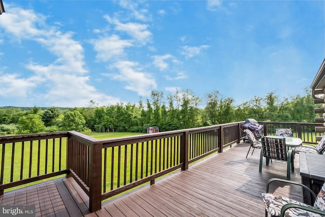 7600 Pohopoco Dr, Kunkletown, PA 18058 - wooden deck featuring outdoor dining area and a lawn