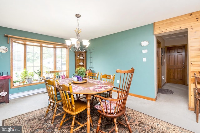 7600 Pohopoco Dr, Kunkletown, PA 18058 - carpeted dining room featuring a chandelier and baseboards