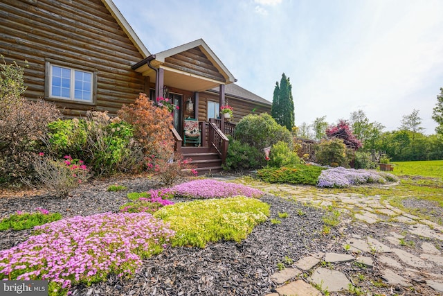 7600 Pohopoco Dr, Kunkletown, PA 18058 - view of front of home featuring covered porch and log siding