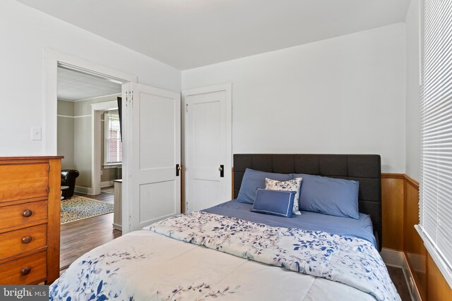 229 E Canal St, Hershey, PA 17033 - bedroom featuring wood finished floors and wainscoting