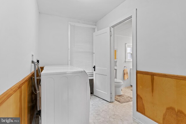 229 E Canal St, Hershey, PA 17033 - laundry room with washer / dryer and a wainscoted wall