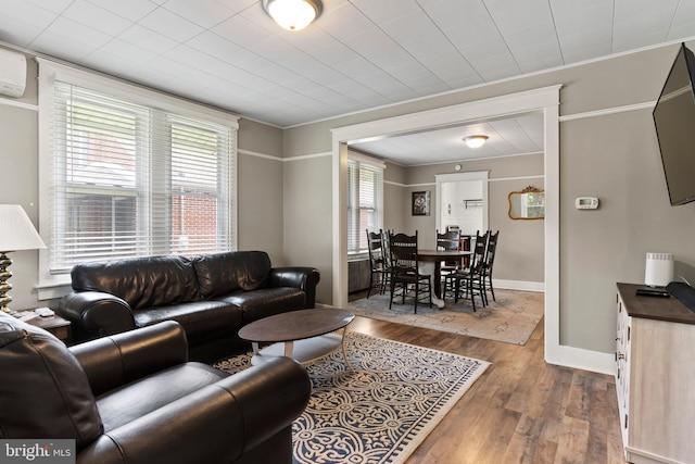 229 E Canal St, Hershey, PA 17033 - living room with wood finished floors and crown molding