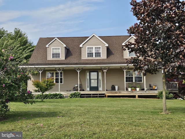 139 High Point Rd, Cochranville, PA 19330 - view of front of house with a front yard, a shingled roof, and covered porch