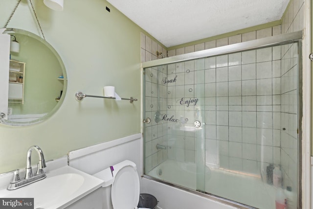 3109 Bero Rd, Halethorpe, MD 21227 - bathroom featuring enclosed tub / shower combo, vanity, and a textured ceiling