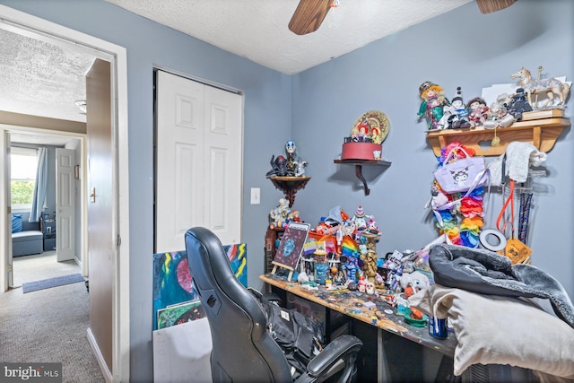 3109 Bero Rd, Halethorpe, MD 21227 - bedroom with carpet flooring, a textured ceiling, a closet, and ceiling fan