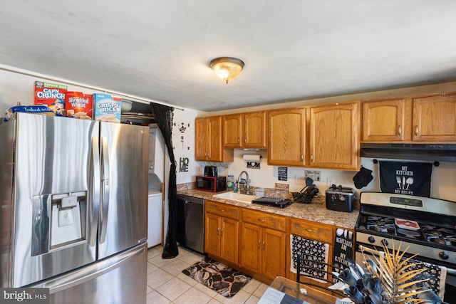3109 Bero Rd, Halethorpe, MD 21227 - kitchen featuring stainless steel appliances, under cabinet range hood, light tile patterned flooring, and brown cabinetry