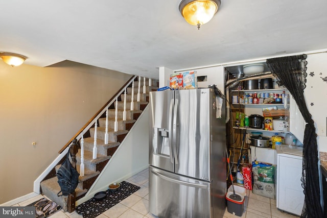 3109 Bero Rd, Halethorpe, MD 21227 - kitchen featuring stainless steel refrigerator with ice dispenser and tile patterned floors