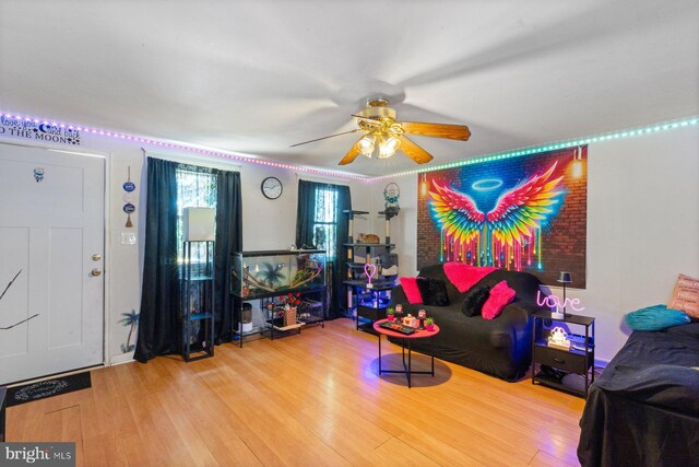 3109 Bero Rd, Halethorpe, MD 21227 - living room with a ceiling fan and wood finished floors