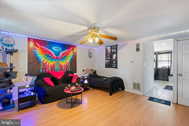 3109 Bero Rd, Halethorpe, MD 21227 - living area featuring ceiling fan and wood finished floors