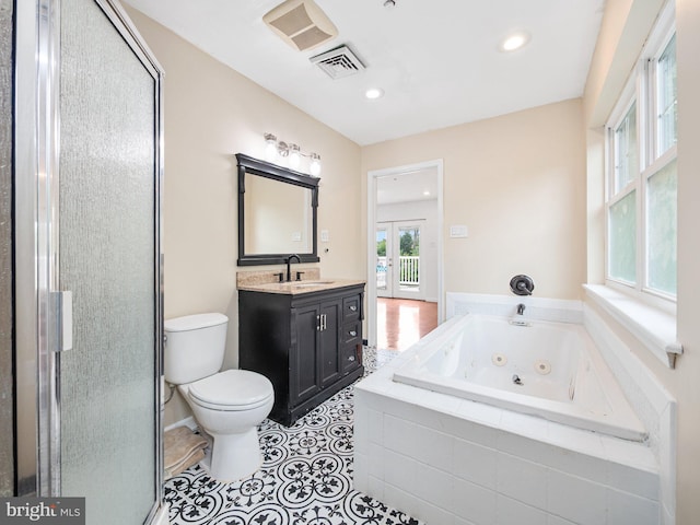 408 Summit Ave, Fort Washington, PA 19034 - bathroom with vanity, a tub with jets, a stall shower, recessed lighting, and tile patterned floors