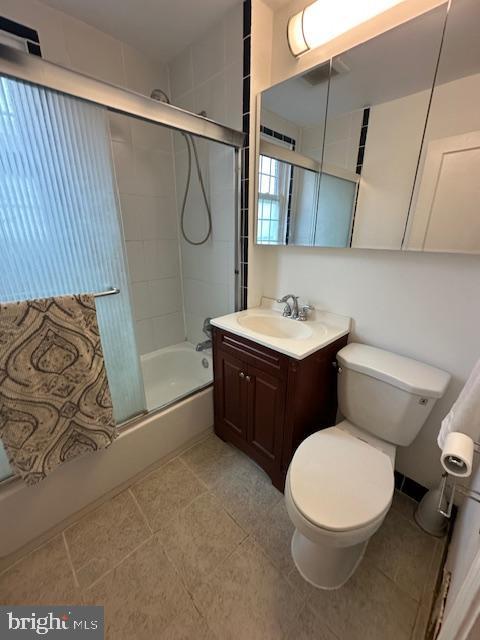 710 Wildell Rd Unit 108, Drexel Hill, PA 19026 - bathroom with bath / shower combo with glass door and vanity