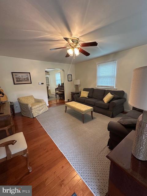 710 Wildell Rd Unit 108, Drexel Hill, PA 19026 - living room with a ceiling fan, wood finished floors, and arched walkways
