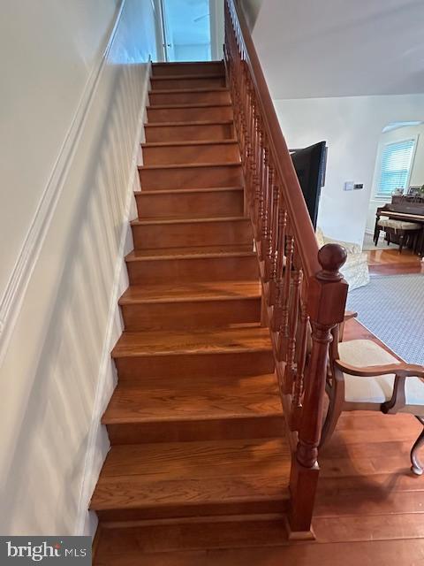 710 Wildell Rd Unit 108, Drexel Hill, PA 19026 - stairway featuring wood finished floors and arched walkways