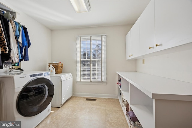 845 Colony Ct, Bryn Mawr, PA 19010 - washroom with cabinet space, washer and dryer, and baseboards