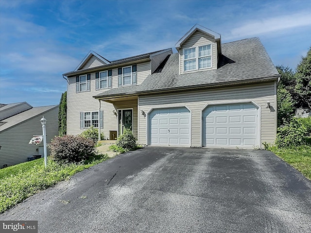25 Domenick Dr, York, PA 17402 - view of front facade featuring driveway and a garage