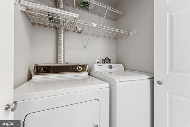 18330 Streamside Dr Unit 303, Gaithersburg, MD 20879 - laundry area with washer and dryer