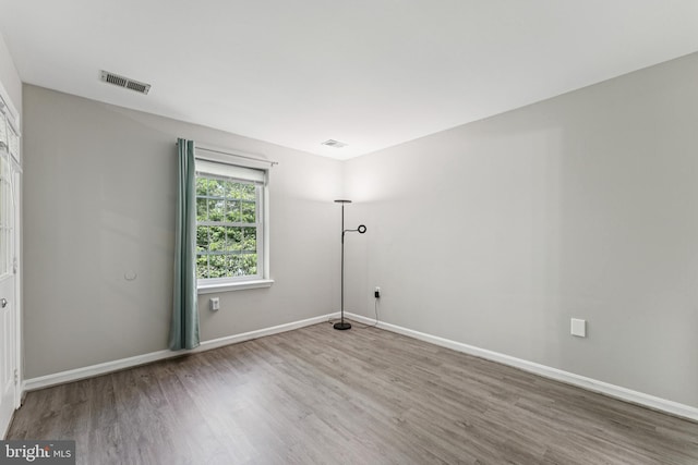 18330 Streamside Dr Unit 303, Gaithersburg, MD 20879 - unfurnished room with wood finished floors and baseboards