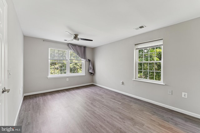 18330 Streamside Dr Unit 303, Gaithersburg, MD 20879 - unfurnished room with wood finished floors, a ceiling fan, and healthy amount of natural light