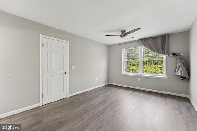 18330 Streamside Dr Unit 303, Gaithersburg, MD 20879 - empty room with ceiling fan and wood finished floors